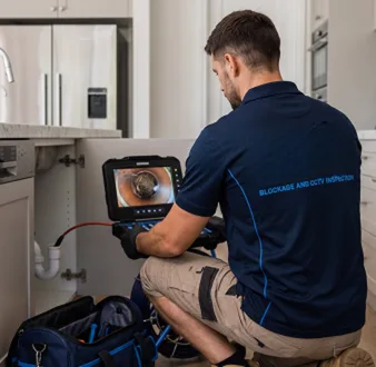 Clearing a blocked sink at a Woronora Heights property